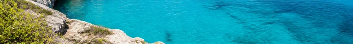 Cuba north coast cliffs beside turquoise water